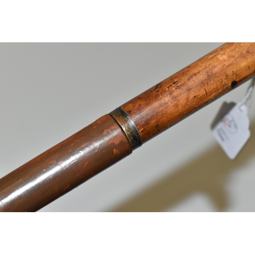 232 - AN ANTIQUE 7MM CENTREFIRE WALKING STICK SHOTGUN IN WORKING ORDER, its handle is made from a  deer's ... 