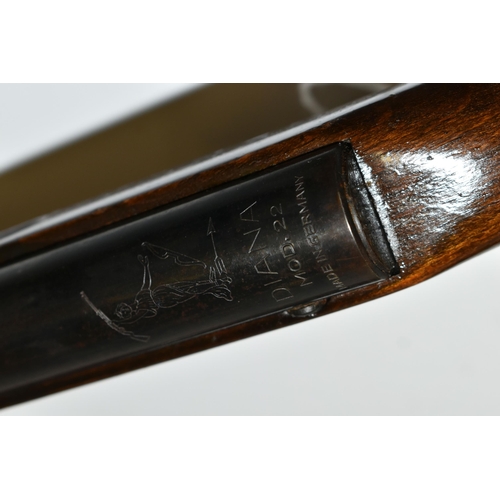 235 - A .22'' DIANA MODEL 22 AIR RIFLE, made in Germany,  in good working order with very little loss of i... 