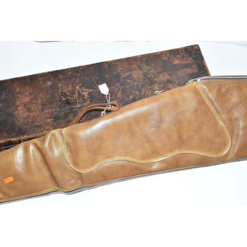 247 - A GOOD QUALITY RIFLE SHOOTING JACKET, a leather on oak shotgun case and a superb high quality fur li... 