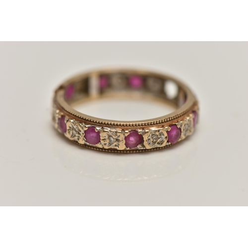 100 - A 9CT GOLD FULL ETERNITY RING, AF split shank, missing a ruby, set with rubies and single cut diamon... 