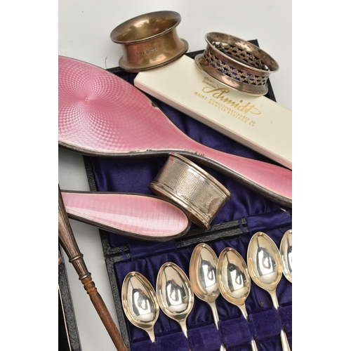 115 - AN ASSORTMENT OF SILVER ITEMS, to include a cased egg cup, a cased set of six teaspoons, four assort... 