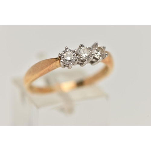 2 - AN 18CT GOLD DIAMOND THREE STONE RING, set with three round brilliant cut diamonds, estimated total ... 