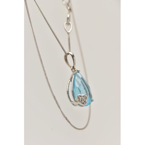 21 - A WHITE METAL TOPAZ AND DIAMOND PENDANT NECKLACE, the pendant set with a pear cut light blue topaz, ... 