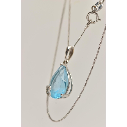 21 - A WHITE METAL TOPAZ AND DIAMOND PENDANT NECKLACE, the pendant set with a pear cut light blue topaz, ... 