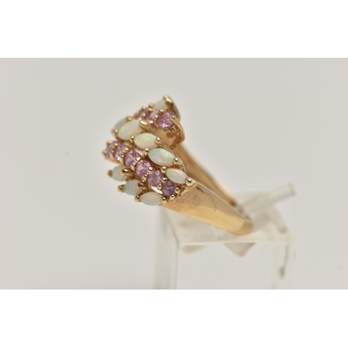 22 - A 9CT GOLD OPAL AND PINK SAPPHIRE DRESS RING, designed with two rows of asymmetrically set circular ... 