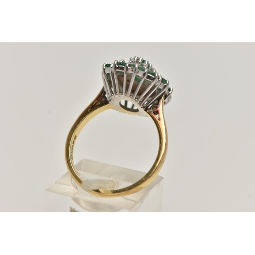 24 - AN 18CT GOLD EMERALD AND DIAMOND CLUSTER RING, oval cluster set with a central oval cut emerald, in ... 