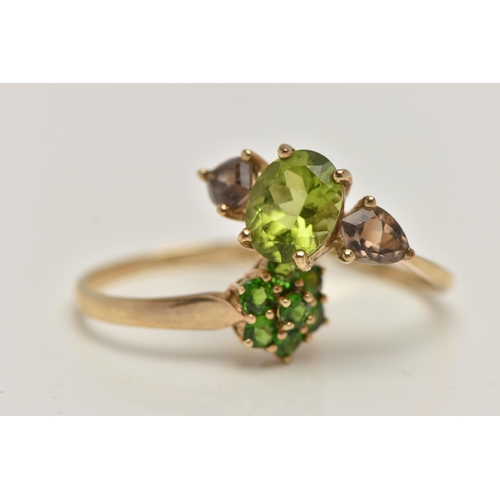 35 - TWO 9CT GOLD GEM SET RINGS, the first a tsavorite garnet cluster ring, flower shape, to a polished b... 