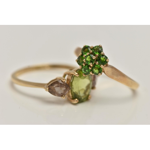 35 - TWO 9CT GOLD GEM SET RINGS, the first a tsavorite garnet cluster ring, flower shape, to a polished b... 