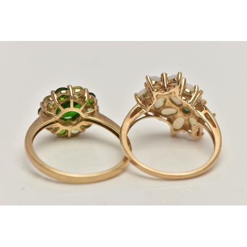 36 - TWO 9CT GOLD GEM SET RINGS, the first a double flower ring set with opals and emeralds, to a polishe... 