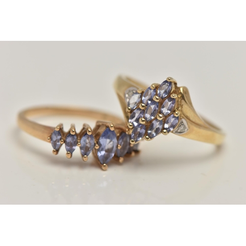 38 - TWO 9CT GOLD GEM SET RINGS, the first set with a row of marquise cut tanzanite, to a polished band, ... 