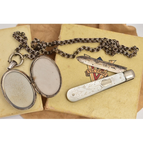 46 - A LATE VICTORIAN SILVER LOCKET AND CHAIN WITH A SILVER FRUIT KNIFE, oval ivy leaf detailed locket, h... 