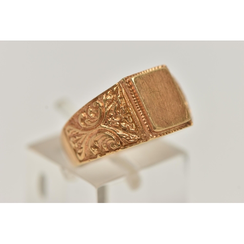 48 - A YELLOW METAL SIGNET RING, polished rectangular signet to scrolling floral shoulders and polished b... 