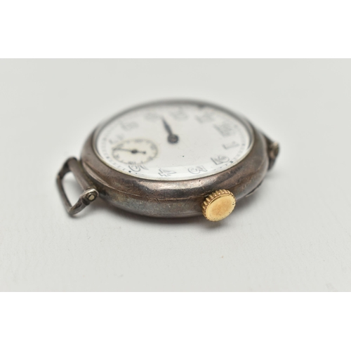 55 - A SILVER WATCH HEAD, hand wound movement, round dial, Arabic numerals, subsidiary dial at the six o'... 