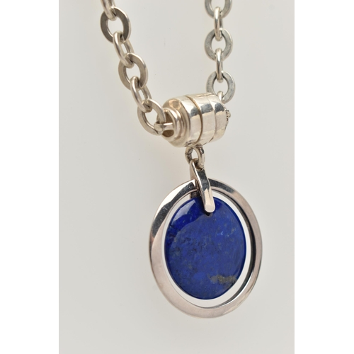 77 - A SILVER LAPIS LAZULI PENDANT NECKLACE, circular polished lapis lazuli pendant, fitted to a Rolo lin... 