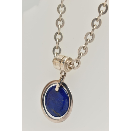 77 - A SILVER LAPIS LAZULI PENDANT NECKLACE, circular polished lapis lazuli pendant, fitted to a Rolo lin... 