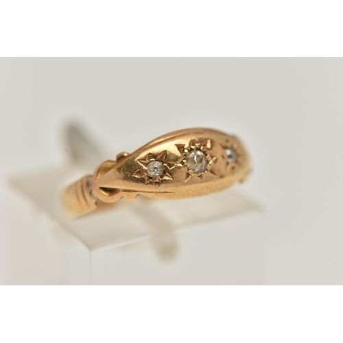 82 - AN EARLY 20TH CENTURY 18CT GOLD DIAMOND RING, designed with three star set diamonds, scroll shoulder... 