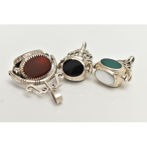 84 - THREE WHITE METAL SWIVEL FOB PENDANTS, each set with semi-precious gemstones such as bloodstone, car... 