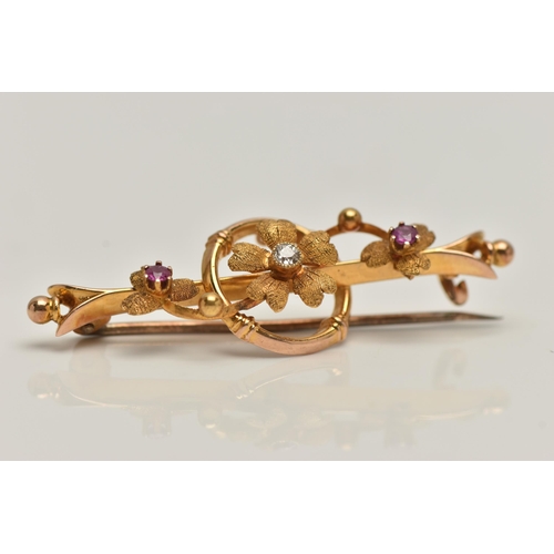 86 - AN EARLY 20TH CENTURY 15CT GOLD BAR BROOCH, floral bar brooch set with a single old cut diamond and ... 