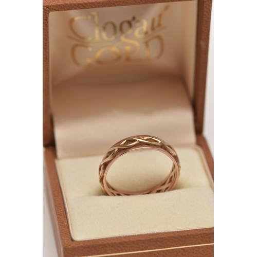 9 - A 9CT ROSE GOLD 'CLOGAU' RING, open work band design, hallmarked 9ct Edinburgh, ring size Q centre, ... 