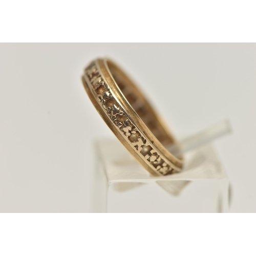 173 - AN 18CT GOLD FULL ETERNITY RING, yellow and white band, set with colourless spinels, hallmarked 18ct... 