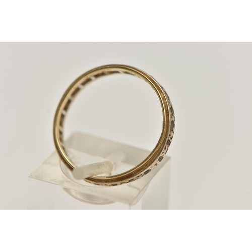 173 - AN 18CT GOLD FULL ETERNITY RING, yellow and white band, set with colourless spinels, hallmarked 18ct... 