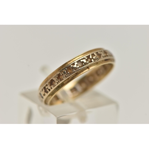 173 - AN 18CT GOLD FULL ETERNITY RING, yellow and white band, set with colourless spinels, hallmarked 18ct... 