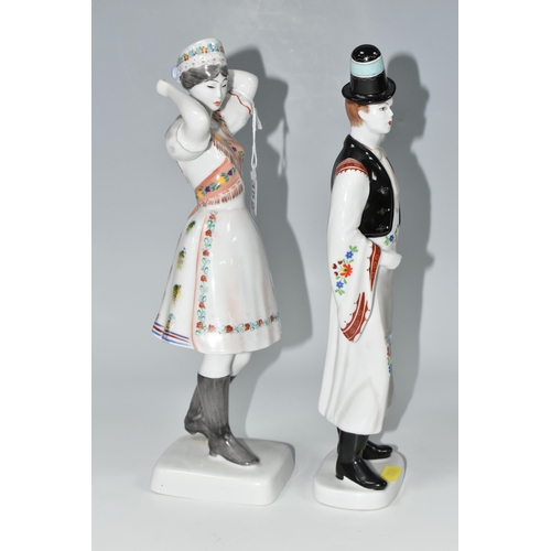 352 - TWO HOLLOHAZA PORCELAIN FIGURES, the Hungarian figures of a young man and woman in traditional dress... 