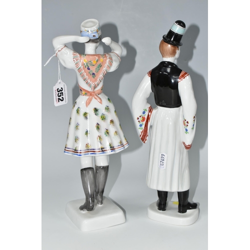 352 - TWO HOLLOHAZA PORCELAIN FIGURES, the Hungarian figures of a young man and woman in traditional dress... 