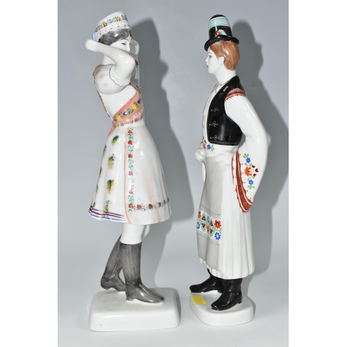 352 - TWO HOLLOHAZA PORCELAIN FIGURES, the Hungarian figures of a young man and woman in traditional dress... 