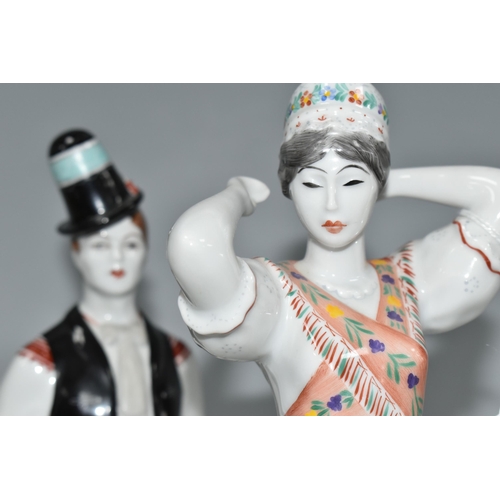 352 - TWO HOLLOHAZA PORCELAIN FIGURES, the Hungarian figures of a young man and woman in traditional dress... 