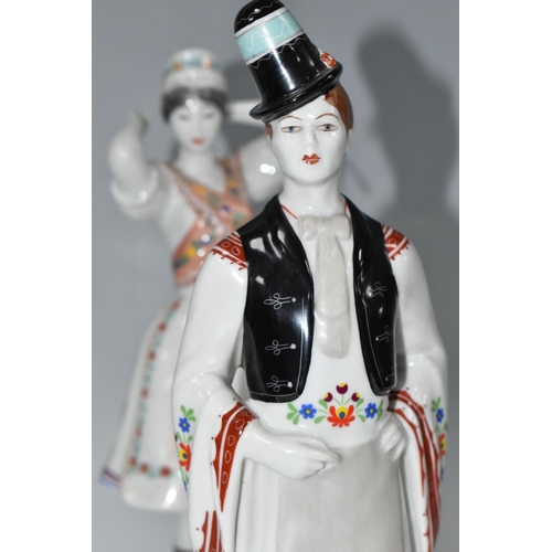 352 - TWO HOLLOHAZA PORCELAIN FIGURES, the Hungarian figures of a young man and woman in traditional dress... 