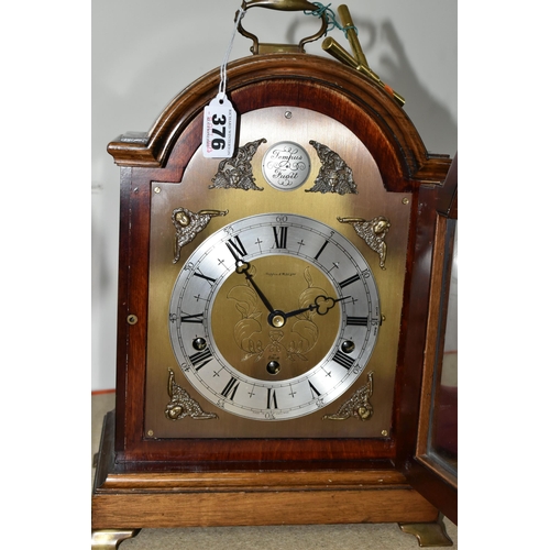 376 - AN ELLIOTT OF LONDON BRACKET CLOCK MADE FOR MAPPIN & WEBB LTD. a brass arched dial with cherub spand... 