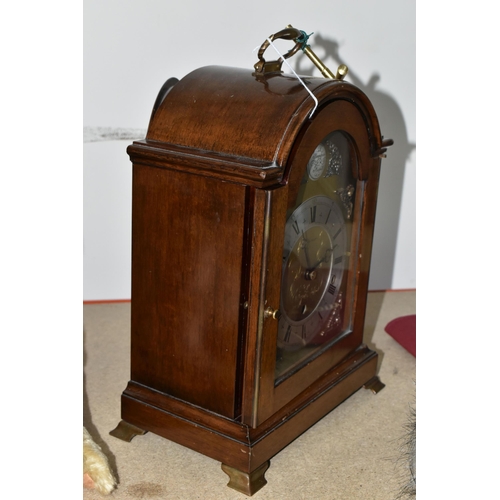 376 - AN ELLIOTT OF LONDON BRACKET CLOCK MADE FOR MAPPIN & WEBB LTD. a brass arched dial with cherub spand... 