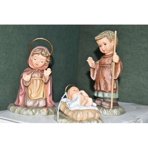 386 - A BOXED HUMMEL PART NATIVITY SET, designed in 1996 'inspired by the art of Berta Hummel', comprising... 