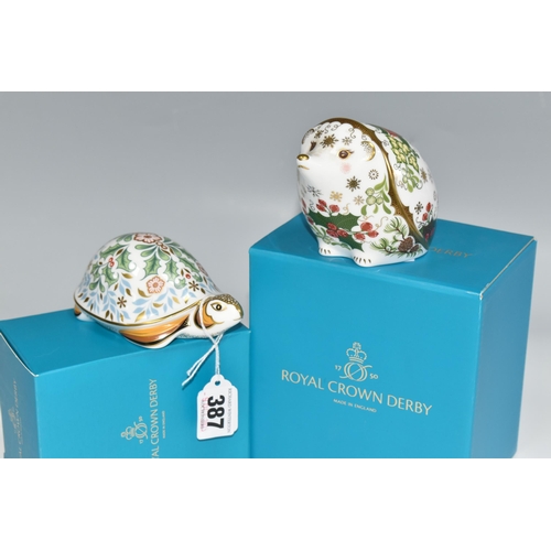 387 - TWO BOXED ROYAL CROWN DERBY CHRISTMAS PAPERWEIGHTS, comprising Christmas Hedgehog and Winter Tortois... 