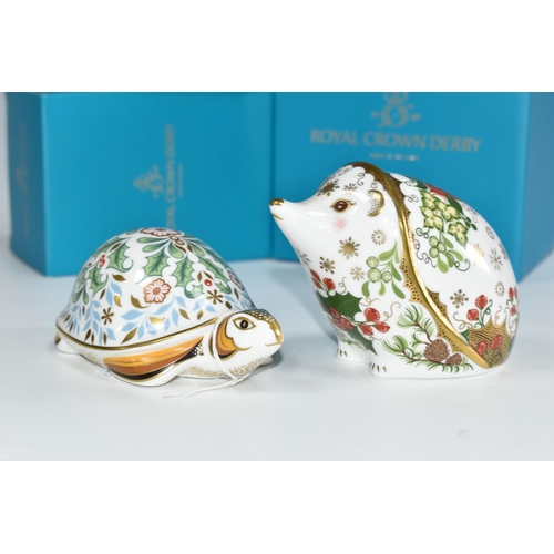 387 - TWO BOXED ROYAL CROWN DERBY CHRISTMAS PAPERWEIGHTS, comprising Christmas Hedgehog and Winter Tortois... 