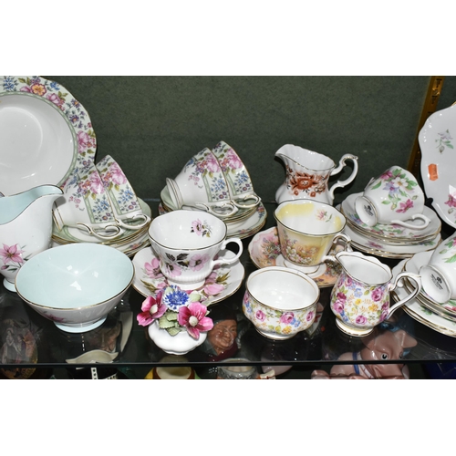 393 - A GROUP OF ROYAL ALBERT TEA WARES, thirty nine pieces in different patterns, comprising a thirteen p... 