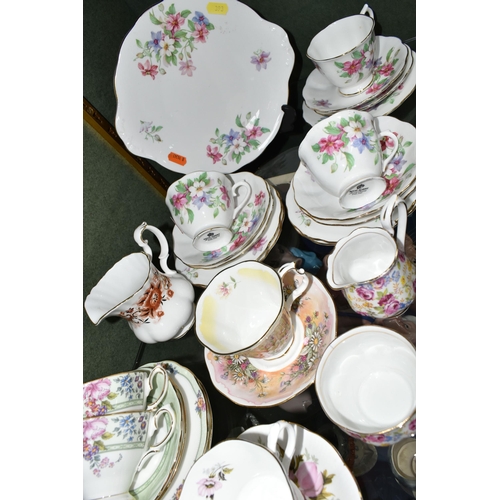 393 - A GROUP OF ROYAL ALBERT TEA WARES, thirty nine pieces in different patterns, comprising a thirteen p... 