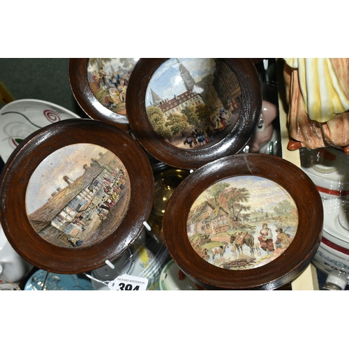 394 - A ROYAL DOULTON 'IBRAHIM' FIGURE AND SEVEN FRAMED PRATTWARE POT LIDS, comprising Royal Doulton Ibrah... 