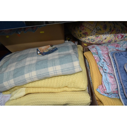 403 - FIVE BOXES OF WOOLLEN BLANKETS, BED THROWS AND CUSHIONS, to include duvet cover sets, bed sheets, fl... 