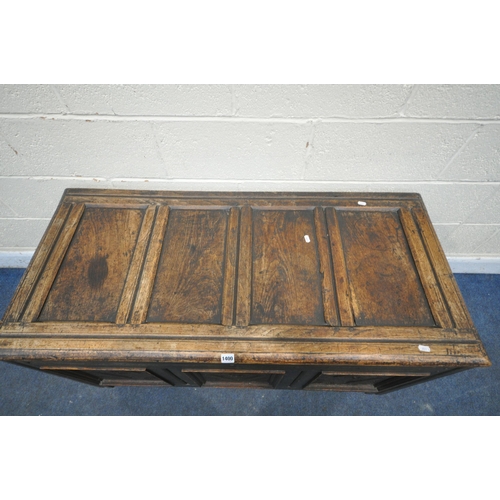 1400 - A GEORGIAN OAK PANELLED COFFER, with three carved front panels, length 121cm x depth 56cm x height 6... 