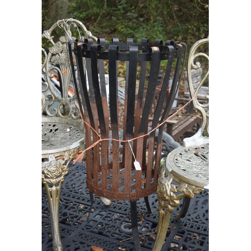 1011 - A MODERN WROUGHT IRON FIRE PIT, diameter 44cm x height 80cm, along with a pair of painted aluminium ... 