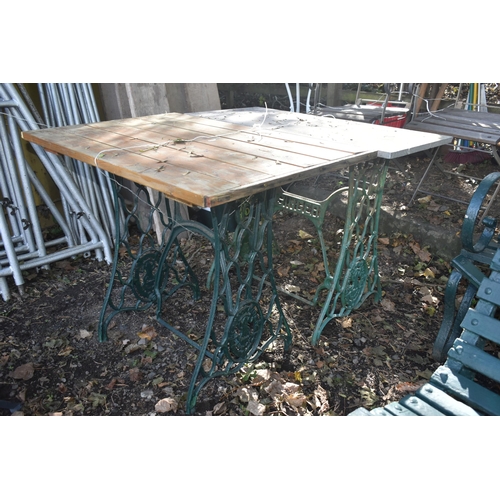 1032 - TWO VINTAGE TREADLE SEWING MACHINE BASES, one with a marble top, the other with a wooden top (2)