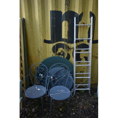 1035 - TWO CIRCULAR METAL GARDEN TABLE and two chairs, along with an aluminium step ladder (condition repor... 