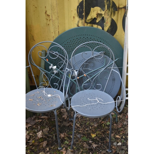 1035 - TWO CIRCULAR METAL GARDEN TABLE and two chairs, along with an aluminium step ladder (condition repor... 