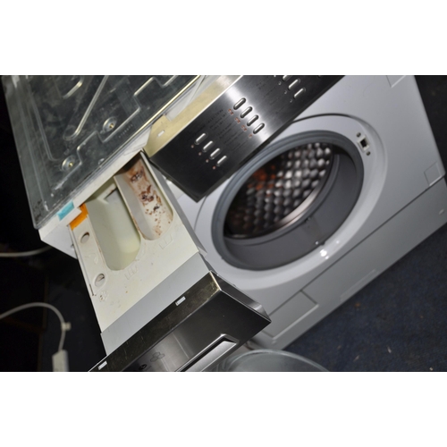 A MIELE W2659 WPM INTEGRATED WASHING MACHINE width 59.5cm depth 58cm height 81cm PAT pass powers