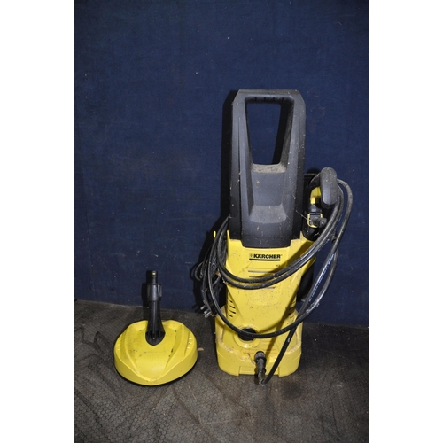 1133 - A KARCHER K2 PRESSURE WASHER, with lance, two nozzles and a Patio attachment (PAT pass and working)