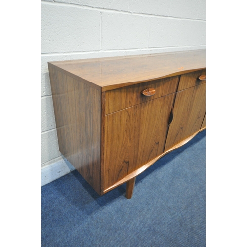 1397 - W H RUSSELL FOR GORDON RUSSELL, A MID-CENTURY MODEL 'BURFORD' R818 ROSEWOOD SIDEBOARD, with a scallo... 