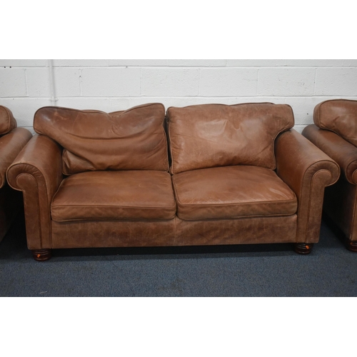 1410 - A BROWN LEATHER THREE PIECE LOUNGE SUITE, comprising a three seater settee, length 200cm x depth 96c... 