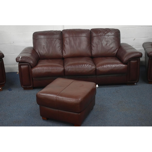 1413 - A BROWN LEATHER FOUR PIECE LOUNGE SUITE, comprising a three seater settee, length 216cm x depth 99cm... 